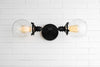 VANITY MODEL No. 2997- Industrial bathroom lighting with a Black finish. Designed and produced by newwineoldbottles at Peared Creation