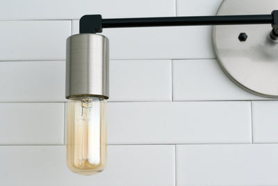 VANITY MODEL No. 3289- Industrial bathroom lighting with a Brushed Nickel/Black finish. Designed and produced by newwineoldbottles at Peared Creation