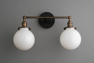 VANITY MODEL No. 5348- Industrial bathroom lighting with a Antique Brass/Black finish. Designed and produced by newwineoldbottles at Peared Creation