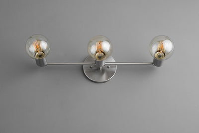 VANITY MODEL No. 0421- Industrial bathroom lighting with a Brushed Nickel finish. Designed and produced by newwineoldbottles at Peared Creation