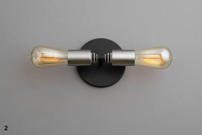 VANITY MODEL No. 0348- Industrial bathroom lighting with a Black/Brushed Nickel finish. Designed and produced by newwineoldbottles at Peared Creation