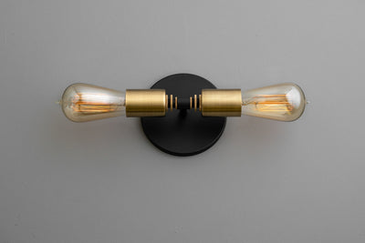 VANITY MODEL No. 0348- Industrial bathroom lighting with a Black/Brushed Brass finish. Designed and produced by newwineoldbottles at Peared Creation
