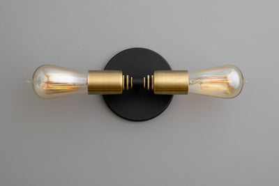 VANITY MODEL No. 0348- Industrial bathroom lighting with a Black/Brushed Brass finish. Designed and produced by newwineoldbottles at Peared Creation