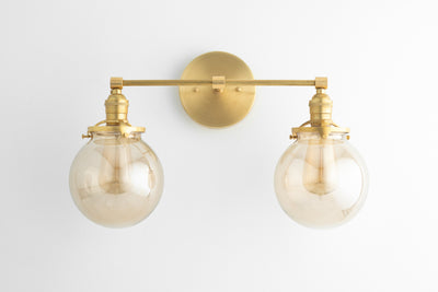VANITY MODEL No. 4270- Mid Century Modern bathroom lighting with a Raw Brass finish. Designed and produced by MODCREATIONStudio at Peared Creation