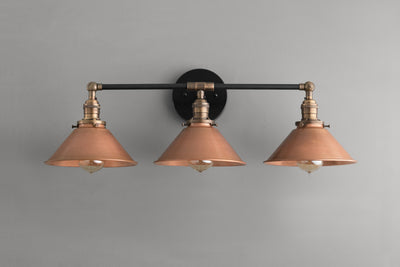 VANITY MODEL No. 2492- Industrial bathroom lighting with a Black/Antique Brass finish. Designed and produced by newwineoldbottles at Peared Creation