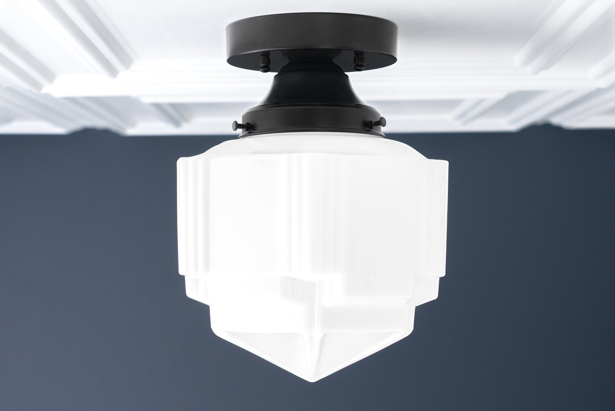 Art Deco flush mount ceiling light with black metal base and white geometric frosted glass globe. - CEILING LIGHT MODEL NO. 9155
