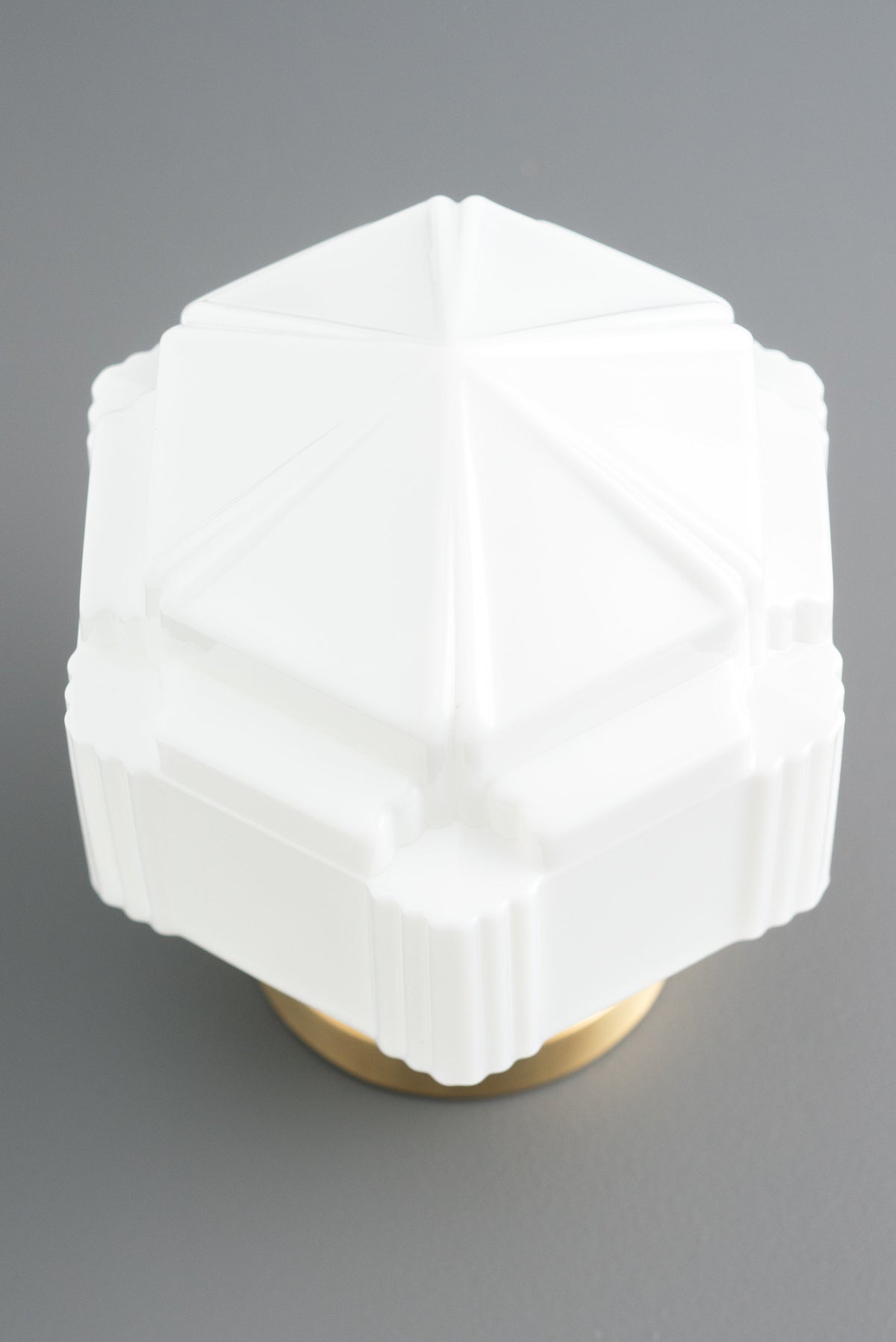 Art Deco white frosted glass globe ceiling light with geometric pattern and brass base. - CEILING LIGHT MODEL NO. 9155
