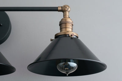 VANITY MODEL No. 3406- Industrial bathroom lighting with a Black finish. Designed and produced by newwineoldbottles at Peared Creation