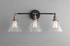 VANITY MODEL No. 4498- Industrial bathroom lighting with a Black/Antique Brass finish. Designed and produced by newwineoldbottles at Peared Creation