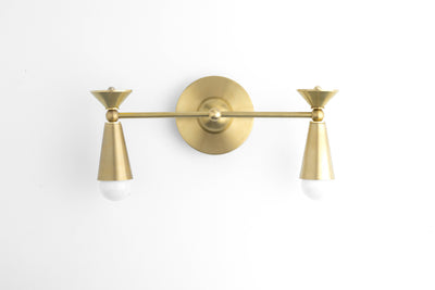VANITY MODEL No. 6920-Art Deco bathroom lighting with a Raw Brass finish. Designed and produced by DECOCREATIONStudio at Peared Creation
