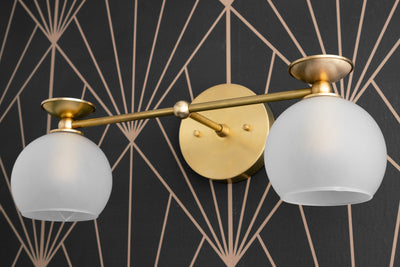 VANITY MODEL No. 8497-Art Deco bathroom lighting with a Raw Brass finish. Designed and produced by DECOCREATIONStudio at Peared Creation