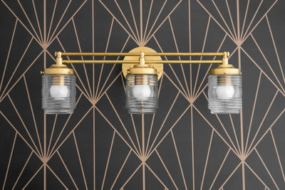 VANITY MODEL No. 8863-Art Deco bathroom lighting with a Raw Brass finish. Designed and produced by DECOCREATIONStudio at Peared Creation