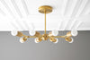 CHANDELIER MODEL No. 1635-Art Deco dining room light fixtures with a Raw Brass finish. Designed and produced by DECOCREATIONStudio at Peared Creation