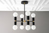 CHANDELIER MODEL No. 2724-Art Deco dining room light fixtures with a Black/Brass finish. Designed and produced by DECOCREATIONStudio at Peared Creation
