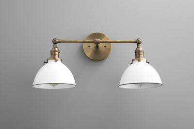 VANITY MODEL No. 4564- Industrial bathroom lighting with a Antique Brass finish. Designed and produced by newwineoldbottles at Peared Creation