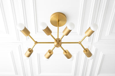 CHANDELIER MODEL No. 1635-Art Deco dining room light fixtures with a Raw Brass finish. Designed and produced by DECOCREATIONStudio at Peared Creation