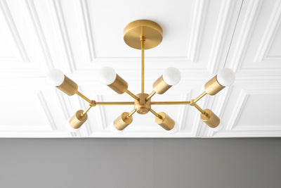 CHANDELIER MODEL No. 1635-Art Deco dining room light fixtures with a Raw Brass finish. Designed and produced by DECOCREATIONStudio at Peared Creation