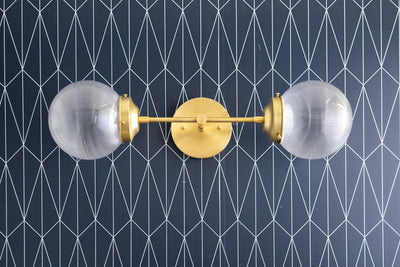 VANITY MODEL No. 2610-Art Deco bathroom lighting with a Raw Brass finish. Designed and produced by DECOCREATIONStudio at Peared Creation