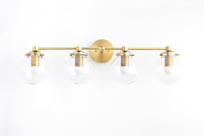 VANITY MODEL No. 8331- Mid Century Modern bathroom lighting with a Raw Brass finish. Designed and produced by MODCREATIONStudio at Peared Creation