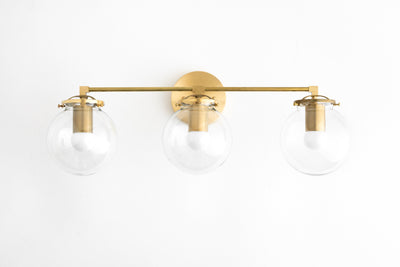 VANITY MODEL No. 4357- Mid Century Modern bathroom lighting with a Raw Brass finish. Designed and produced by MODCREATIONStudio at Peared Creation