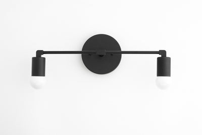 VANITY MODEL No. 8412- Mid Century Modern bathroom lighting with a Black finish. Designed and produced by MODCREATIONStudio at Peared Creation