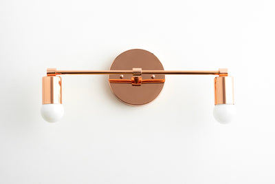 VANITY MODEL No. 8412- Mid Century Modern bathroom lighting with a Rose Gold finish. Designed and produced by MODCREATIONStudio at Peared Creation