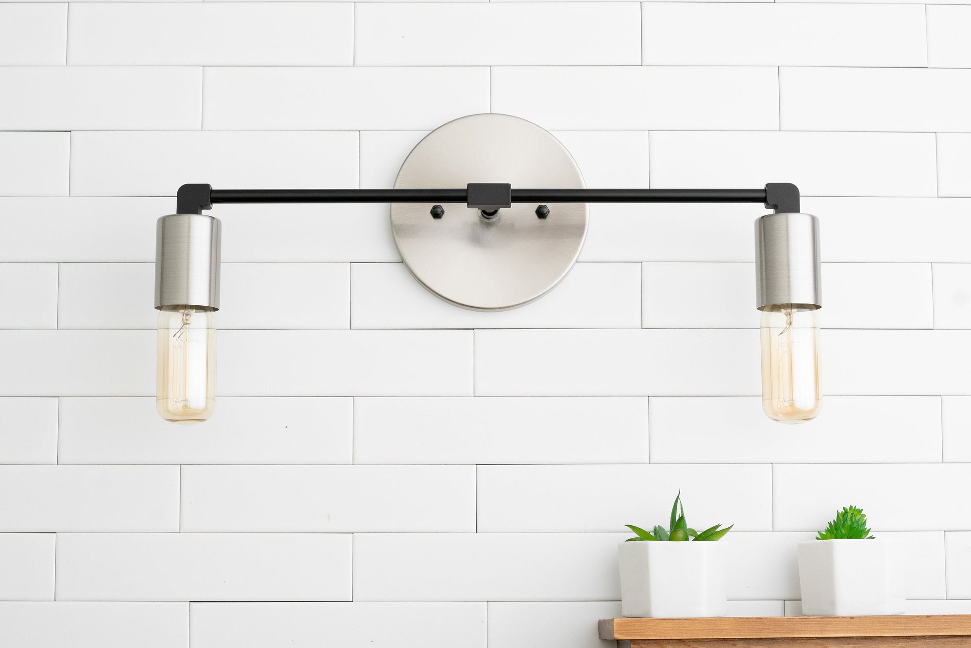 VANITY MODEL No. 3289- Industrial bathroom lighting with a Brushed Nickel/Black finish. Designed and produced by newwineoldbottles at Peared Creation