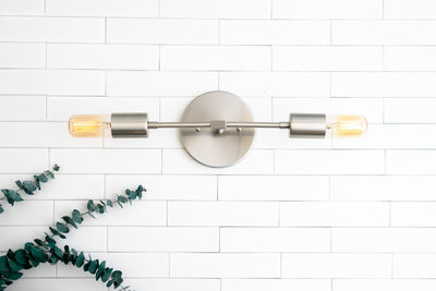 VANITY MODEL No. 5109- Industrial bathroom lighting with a Brushed Nickel finish. Designed and produced by newwineoldbottles at Peared Creation