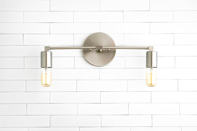 VANITY MODEL No. 3289- Industrial bathroom lighting with a Brushed Nickel finish. Designed and produced by newwineoldbottles at Peared Creation