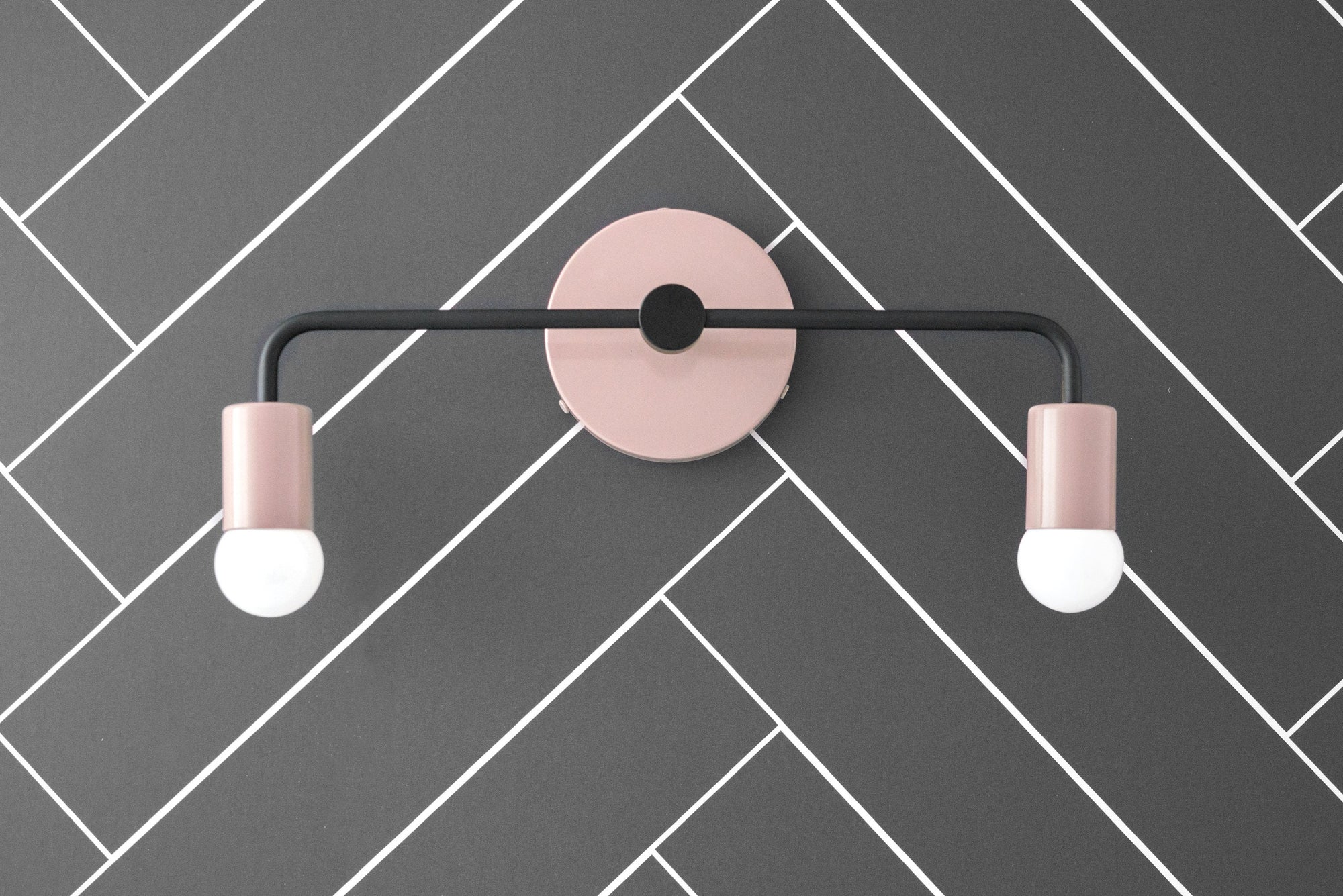 Scandinavian-style two-bulb vanity light with mauve matte metal shades and black rod mount. - VANITY LIGHT MODEL NO. 1071